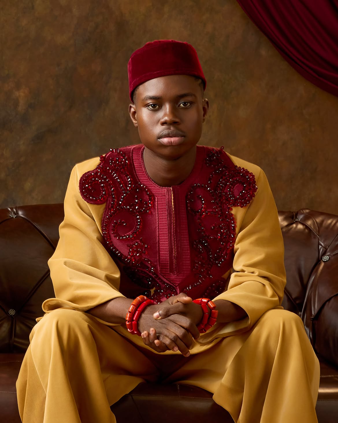 Jarvis and Peller's Gold and deep Crimson wedding outfit