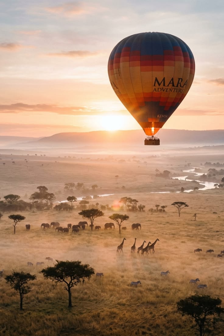 hot air balloon Serengeti sunrise, wildebeest migration Mara river crossing, safari balloon aerial view wildlife