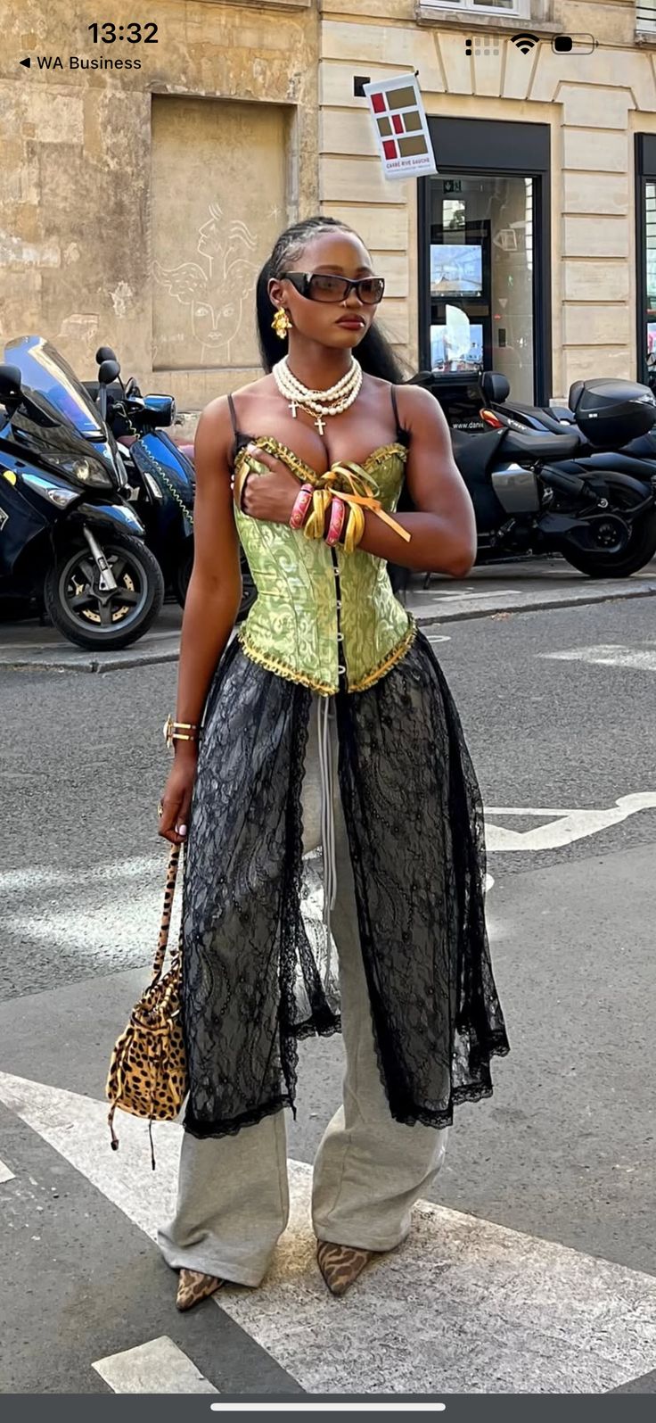 Woman wearing statement accessories with a stylish fashion outfit