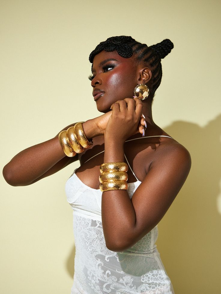 Woman wearing statement accessories with a stylish fashion outfit