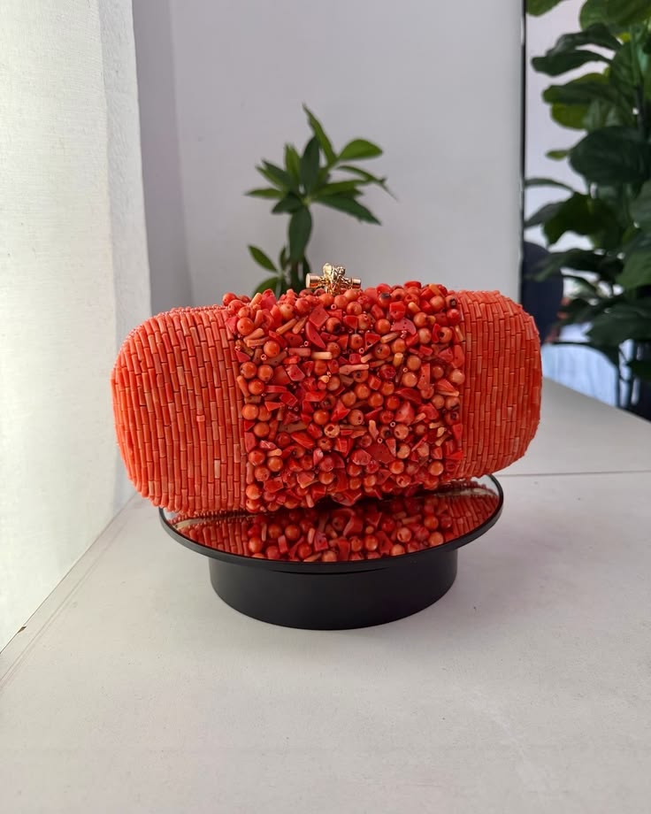 Nigerian designer handbag with a sculptural and artistic design