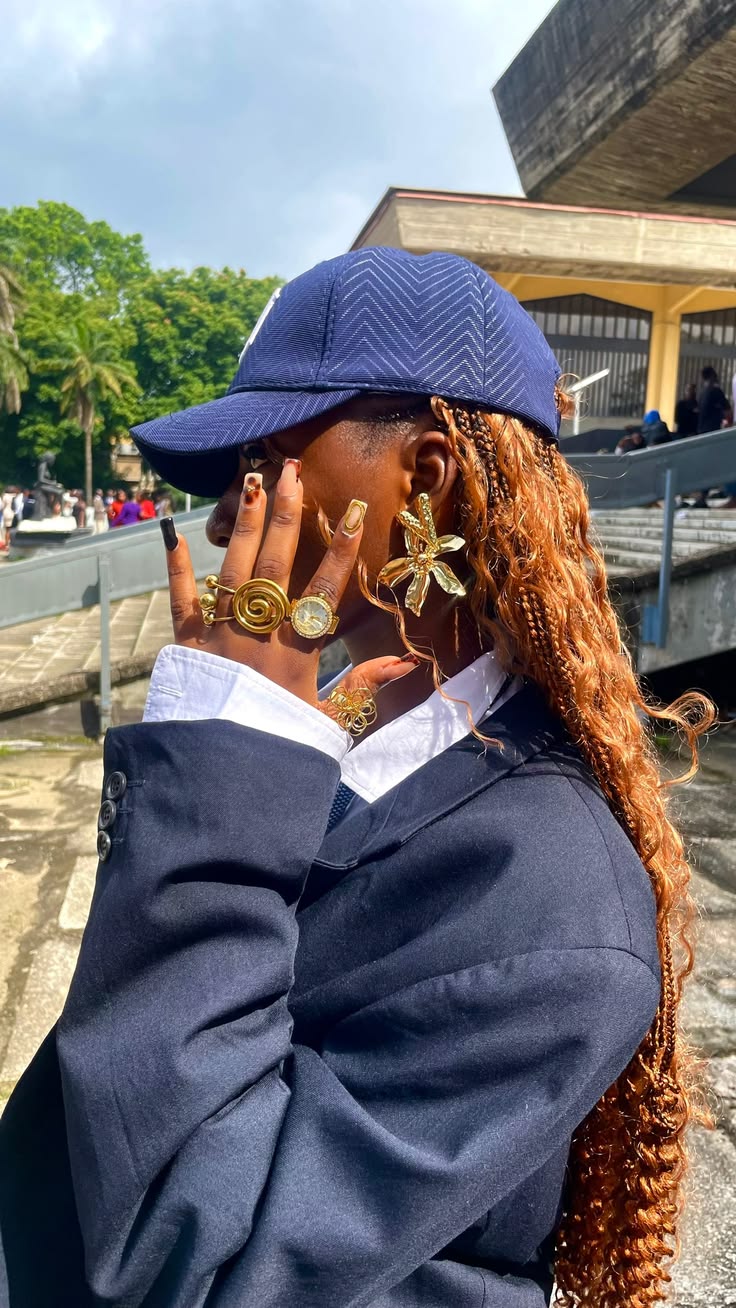 Woman wearing statement accessories with a stylish fashion outfit